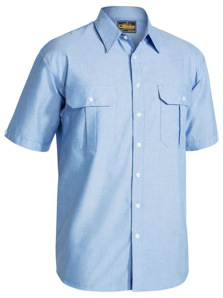A blue coloured mens work shirt with collared neck and button down closure. It has two chest button open pockets with pleat detailing. Also comes with a back pleat and mix fabric for comfort and flexibility.