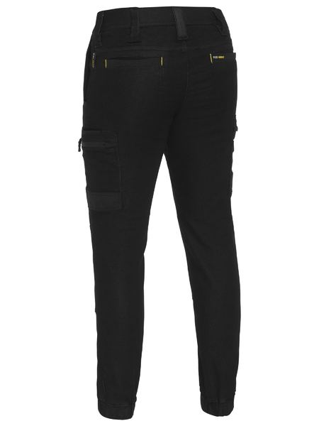 A black coloured denim cargo work pants for men with a drawcord waistband. It has several multifunctional pockets with seven strong loops. Made up of a mix of cotton, polyester and spandex for maximum stretch and comfort.