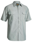 A green coloured mens work shirt with collared neck and button down closure. It has two chest button open pockets with pleat detailing. Also comes with a back pleat and mix fabric for comfort and flexibility.