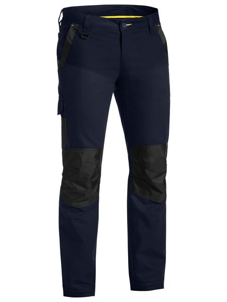 A navy coloured work pant for men with a curved waistband. It has several multifunctional pockets with oxford patches. Made up of a mix of cotton, polyester and spandex for ultimate comfort and stretch.
