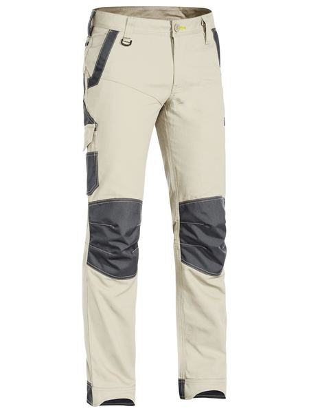 A stone coloured work pant for men with a curved waistband. It has several multifunctional pockets with oxford patches. Made up of a mix of cotton, polyester and spandex for ultimate comfort and stretch. 