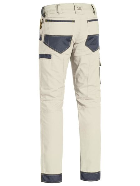 A stone coloured work pant for men with a curved waistband. It has several multifunctional pockets with oxford patches. Made up of a mix of cotton, polyester and spandex for ultimate comfort and stretch.