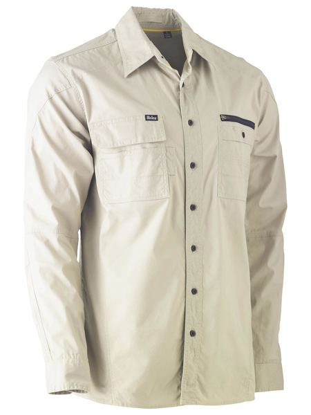 A stone coloured workwear shirt for men with an active fit. It is equipped with two multifunctional chest pockets and contoured sleeves. Also comes with a hanger loop on the structured collar. Made up of stretch cotton for ease of movement. 